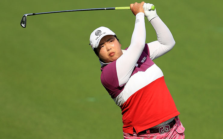 Feng poised five back