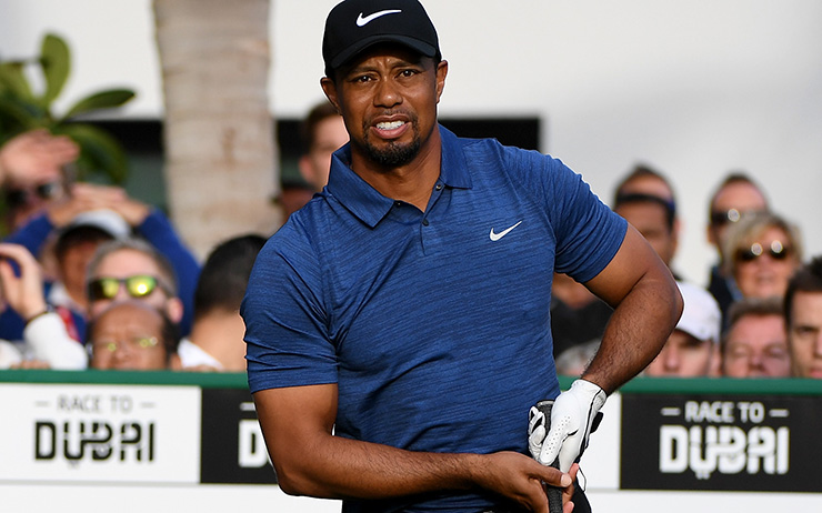 Watch Tiger Woods hit his first public golf shots in more than two months