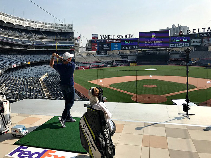 Rory McIlroy hits golf balls at Yankee Stadium, provides updates on his injury and caddie search
