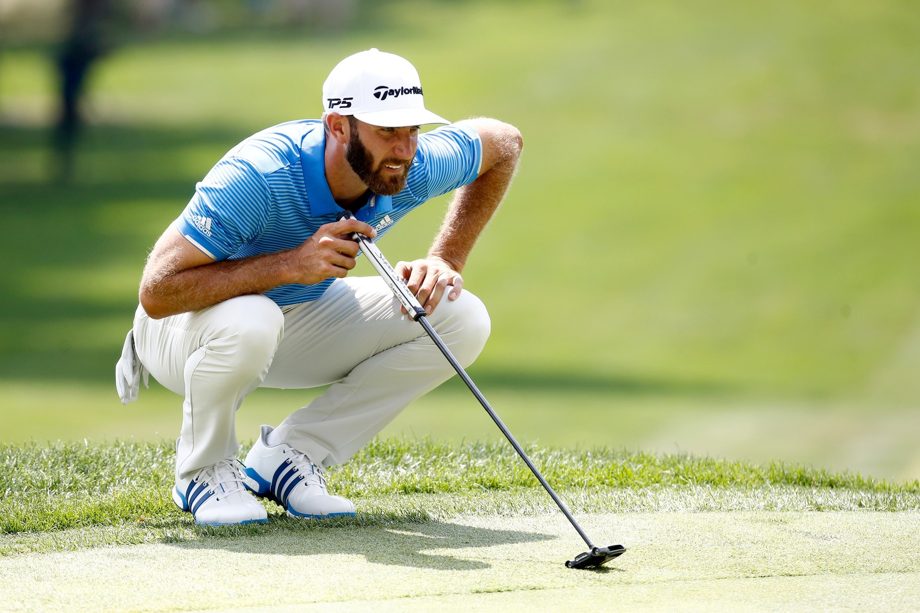 Dustin Johnson opens defence with 68 while focus is on others