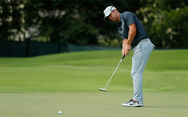 Paul Casey shoots 65, leads by two shots at the Tour Championship