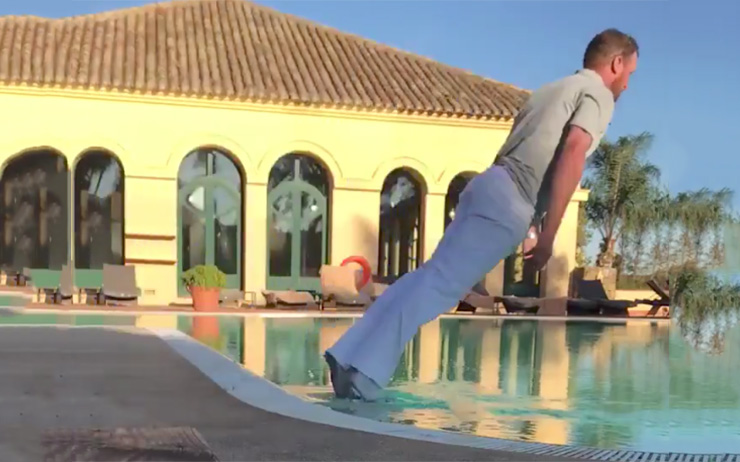 Former Ryder Cup hero celebrates keeping his European Tour card by falling into a pool with his clothes on