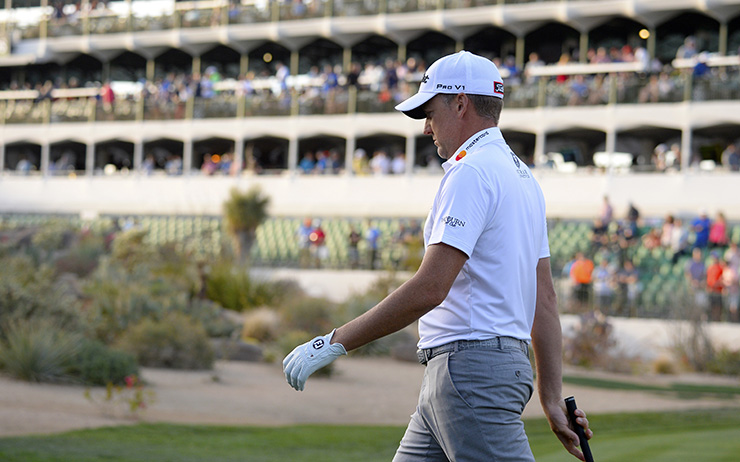 ICYMI: Watch Ian Poulter hit shank into the stands on 16th hole at TPC Scottsdale, high fives fan