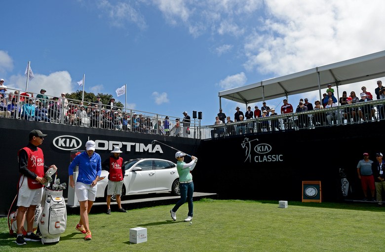 The latest LPGA champ won two cars in two hours on Sunday