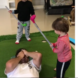 Dad trusts infant son to hit a golf shot off his face, predictably pays a painful price