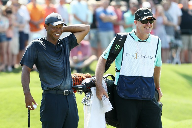 Auction bidder gets once once-in-a-lifetime opportunity to caddie for Tiger Woods thanks to $50,000 donation