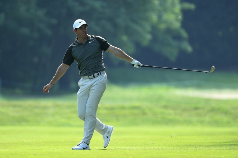 Rory McIlroy hits three spectators with errant shots, yet is tied for the BMW PGA Championship lead