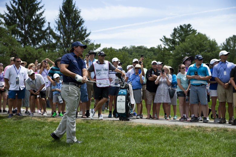 Phil Mickelson calls a two-stroke penalty on himself for improving line of play