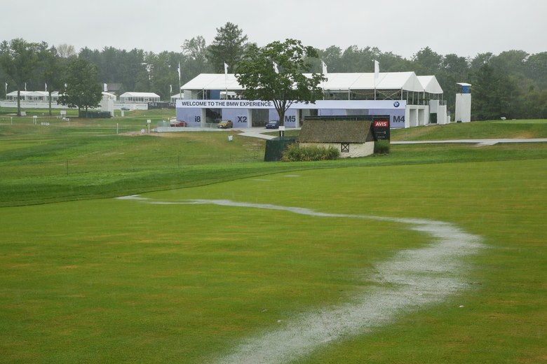 Unremitting rain postpones final round of BMW Championship, threatens to cancel it and make Justin Rose the winner