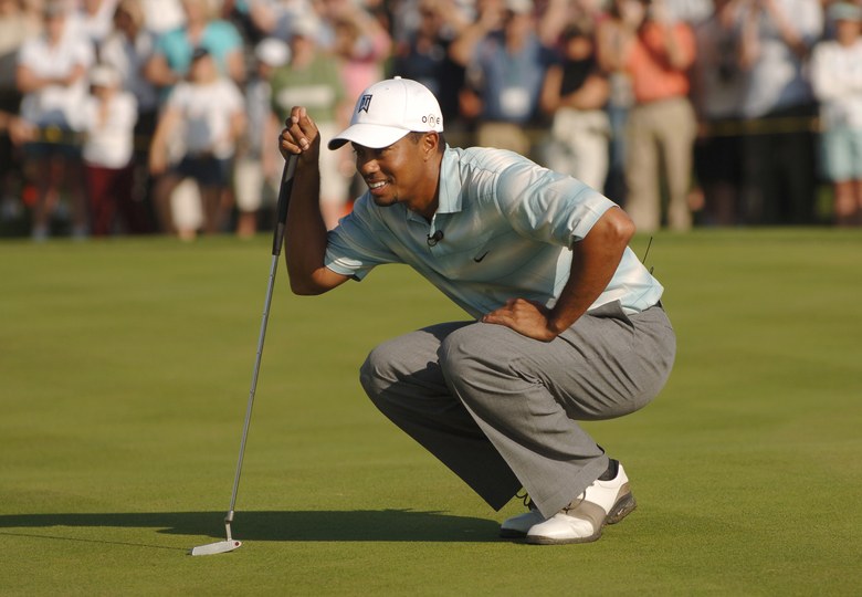 Tiger Woods, following another rough short game performance, returns to old Scotty Cameron putter