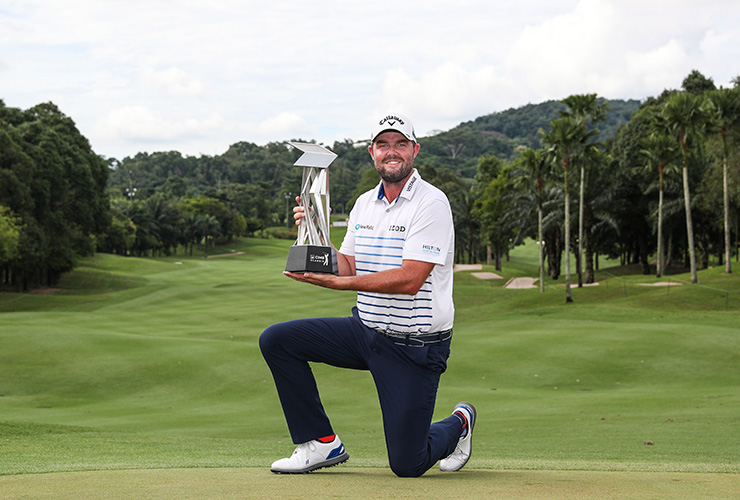 With a Sunday 65, Marc Leishman cruises to a five-stroke win at the CIMB Classic
