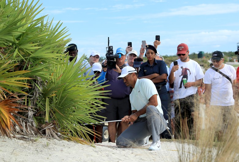 Tiger Woods avoids penalty for double-hitting a shot, but not controversy on Day 2 at Hero World Challenge