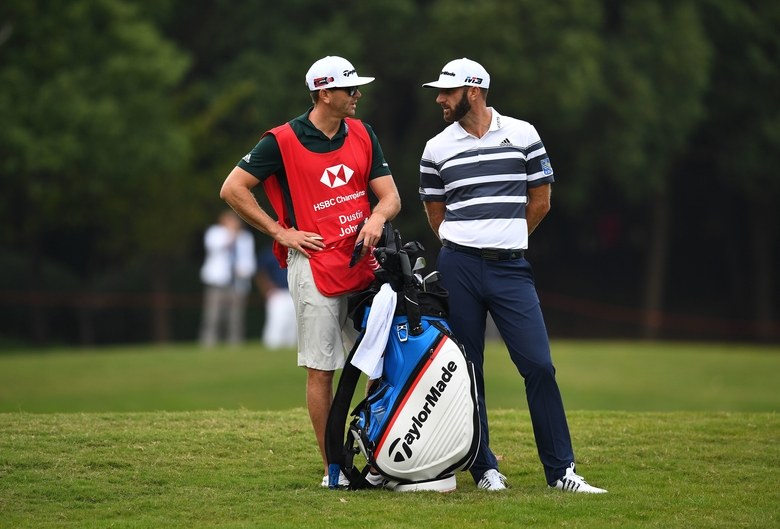 Dustin Johnson and his caddie spent the entire off-season studying golf’s new rules (Kidding!)