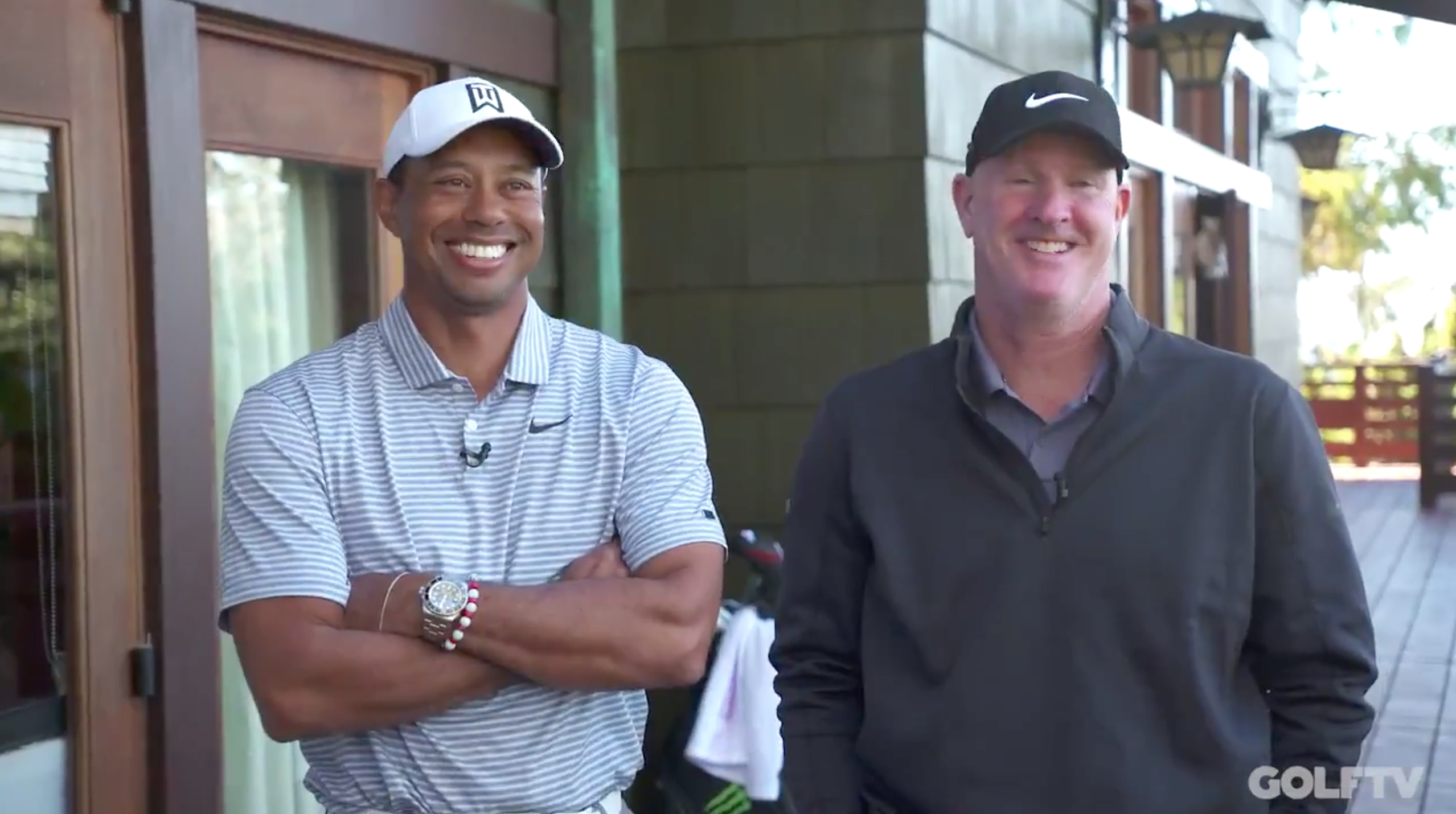 Tiger Woods practices with flagstick in, yuks it up with caddie Joe LaCava in first of new video series
