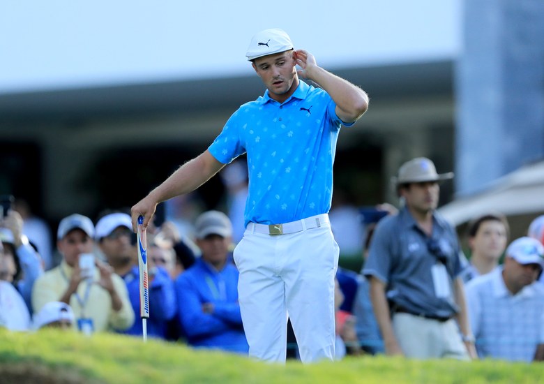 Bryson DeChambeau apologises after cameras catch him damaging green during outburst at WGC-Mexico Championship