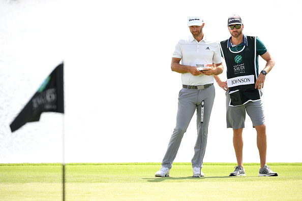 Johnson rolls into moving day at Saudi International with course record 61