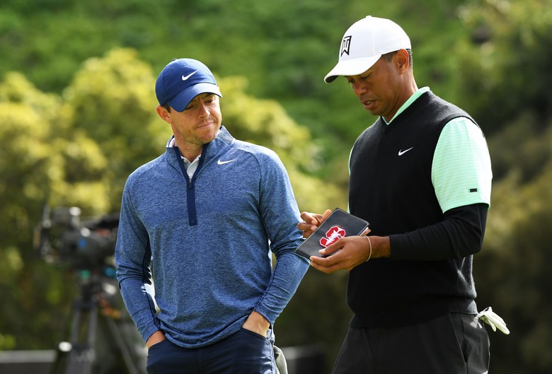 Rory McIlroy says Tiger Woods was receiving treatment for his neck before, during WGC-Mexico Championship