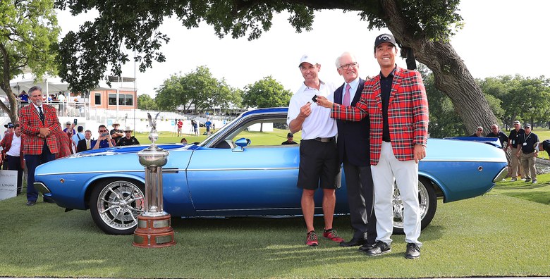 Kevin Na gives Kenny Harms the best caddie gift ever: the sweet Dodge muscle car he won at the Charles Schwab Challenge