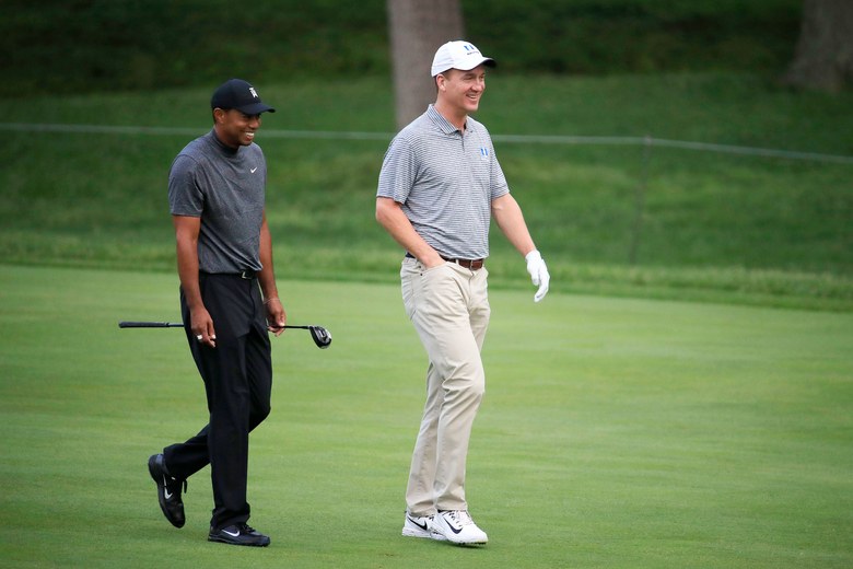 Tiger Woods catches up with Jack Nicklaus, Peyton Manning as he settles in at Muirfield Village for his next on-course test
