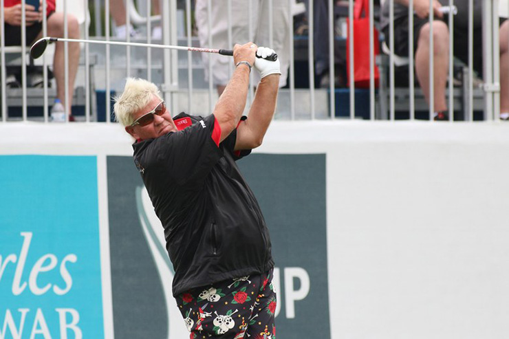 Watch John Daly bank an approach off bleachers to 10 feet of pin