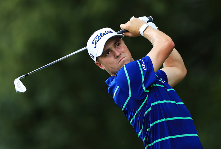 Play suspended for the day at East Lake, Justin Thomas leads by one as marathon Sunday awaits