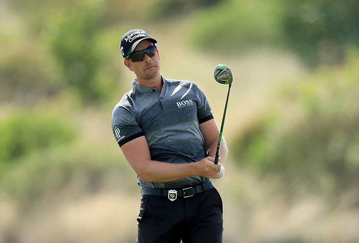Henrik Stenson’s tap-in eagle gives him a one-stroke victory, while Tiger Woods slips to fourth