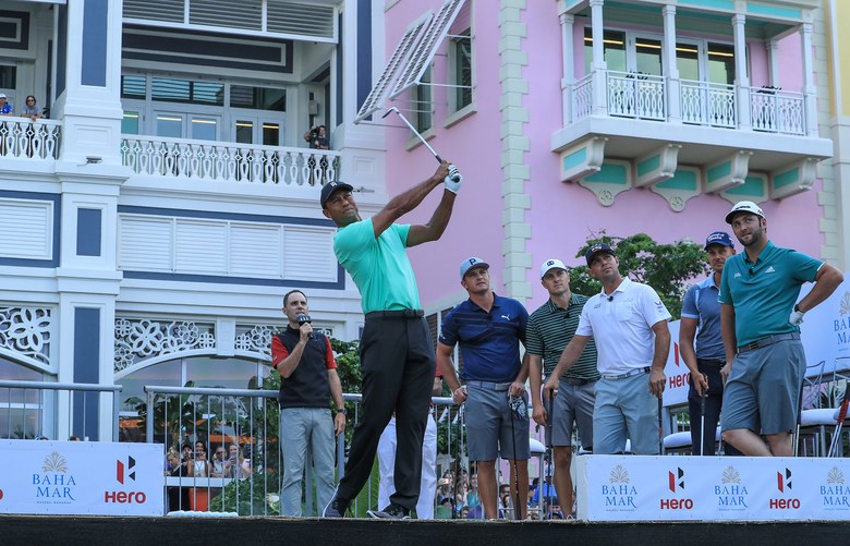 Tiger Woods kicks off Hero World Challenge week with a victory in the ‘Hero Shot’