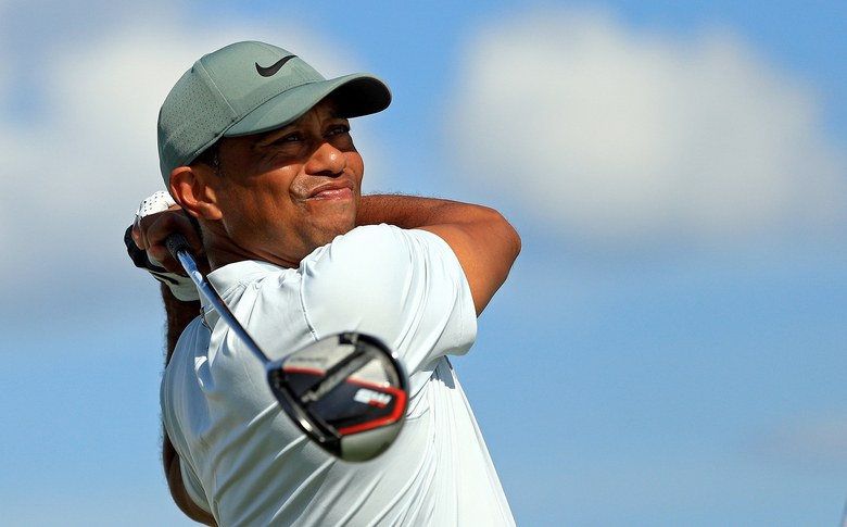 Tiger Woods shoots bogey-free 66 to climb leader board at Hero World Challenge