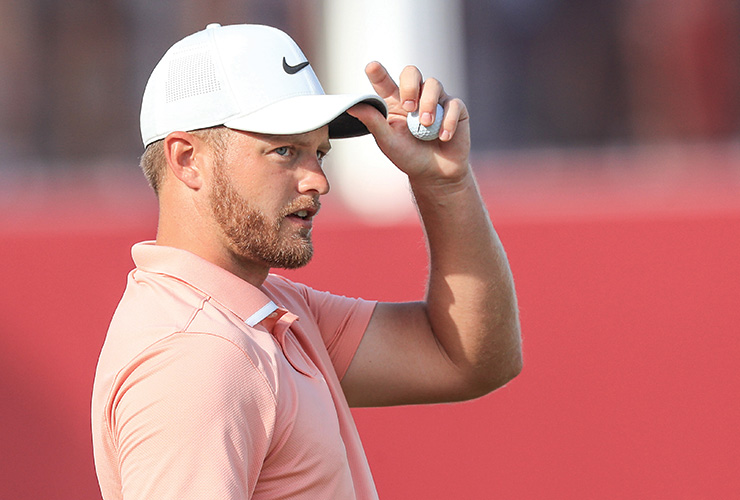 Tom Lewis, two back heading into Sunday at Dubai, says ‘if it’s meant to be, it’s meant to be’