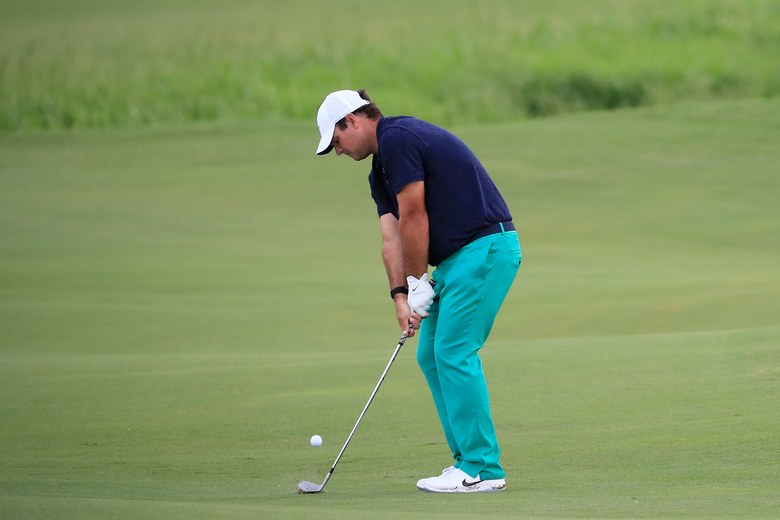 Patrick Reed embraces the miserable weather, shoots 66 and is one off the lead