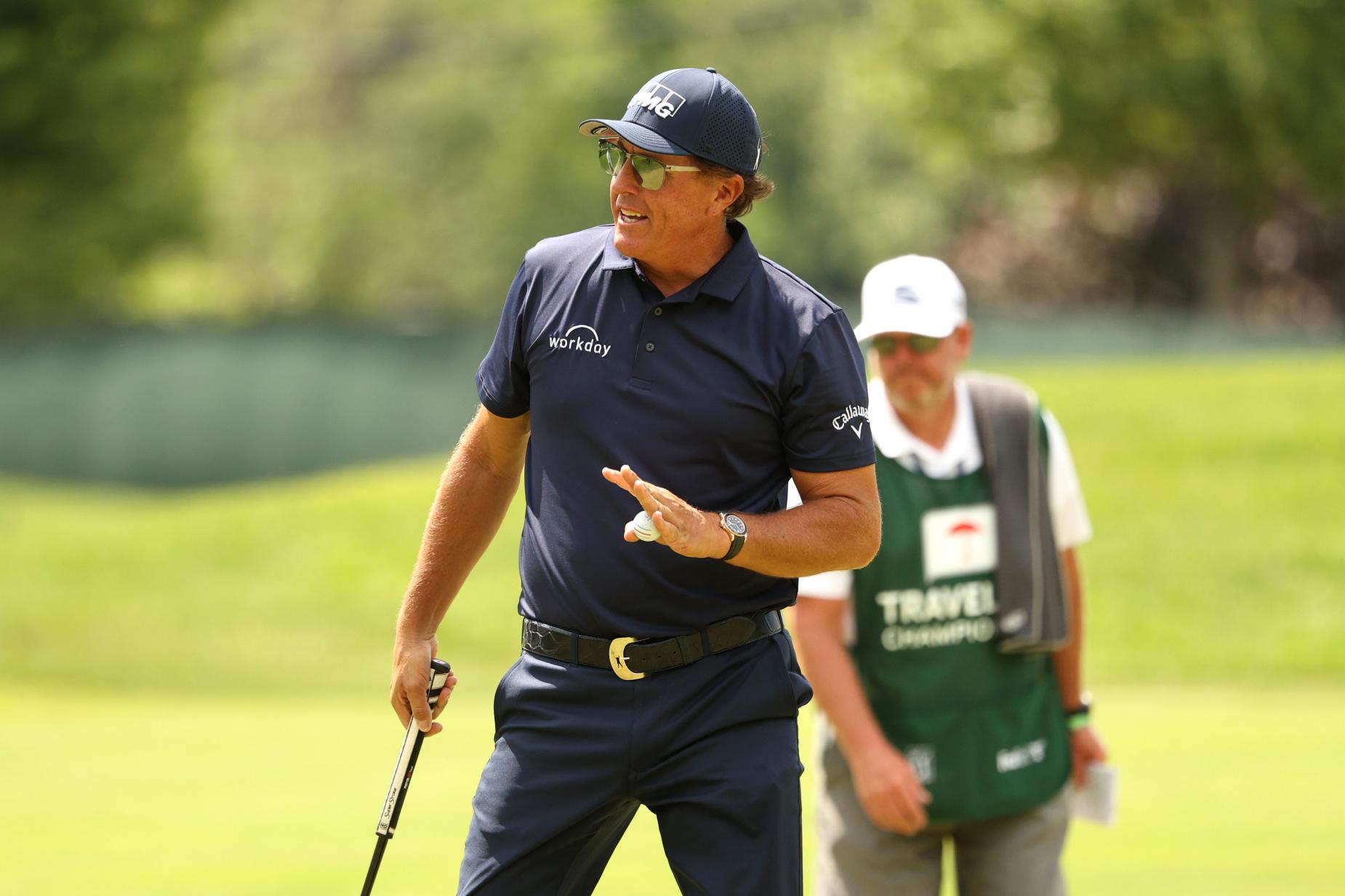 Phil Mickelson got a huge rules break on his way to taking Travelers lead