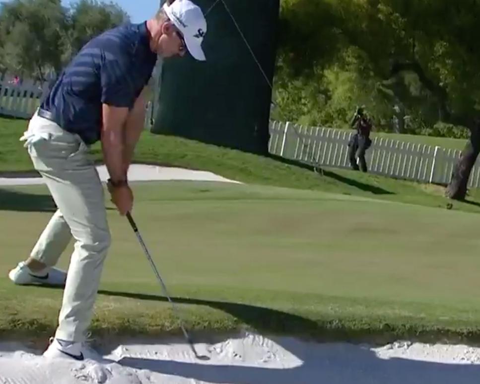Watch Martin Laird make the most incredible eagle by holing this impossible-looking bunker shot from a buried lie