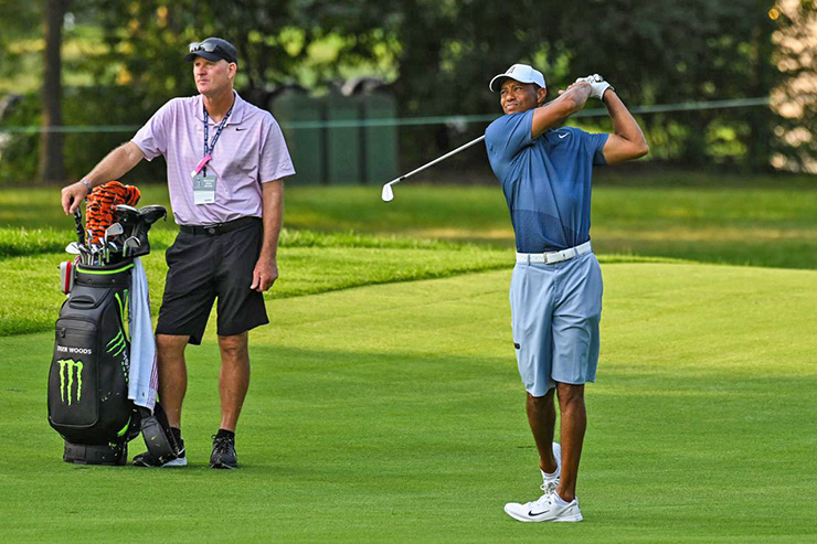 Charlie Woods’ caddie while playing alongside his father will continue the family theme