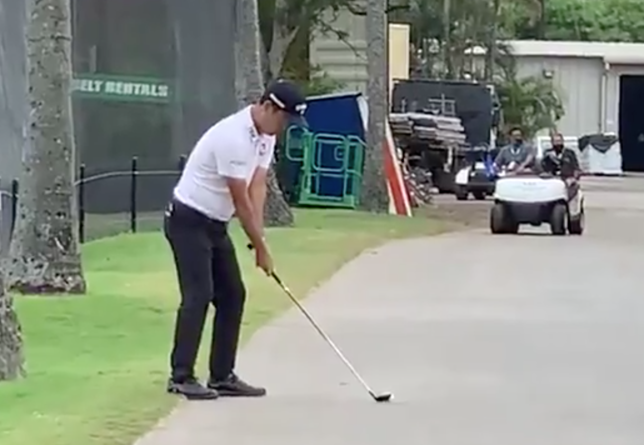 Watch Kevin Na make hitting this fairway wood off a concrete cart path look way too easy