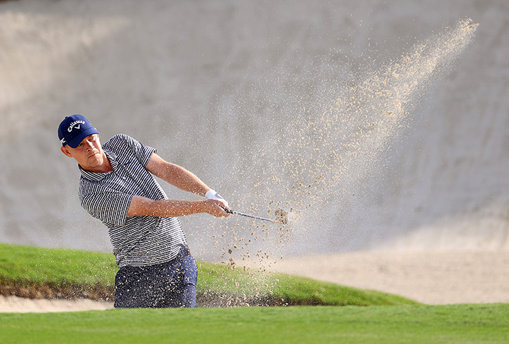 Dane Jeff Winther leads by two after windy, wild Friday in Doha