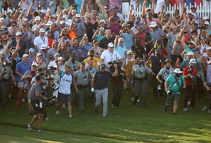 The scene on the 18th hole as Phil Mickelson made history was something out of a movie