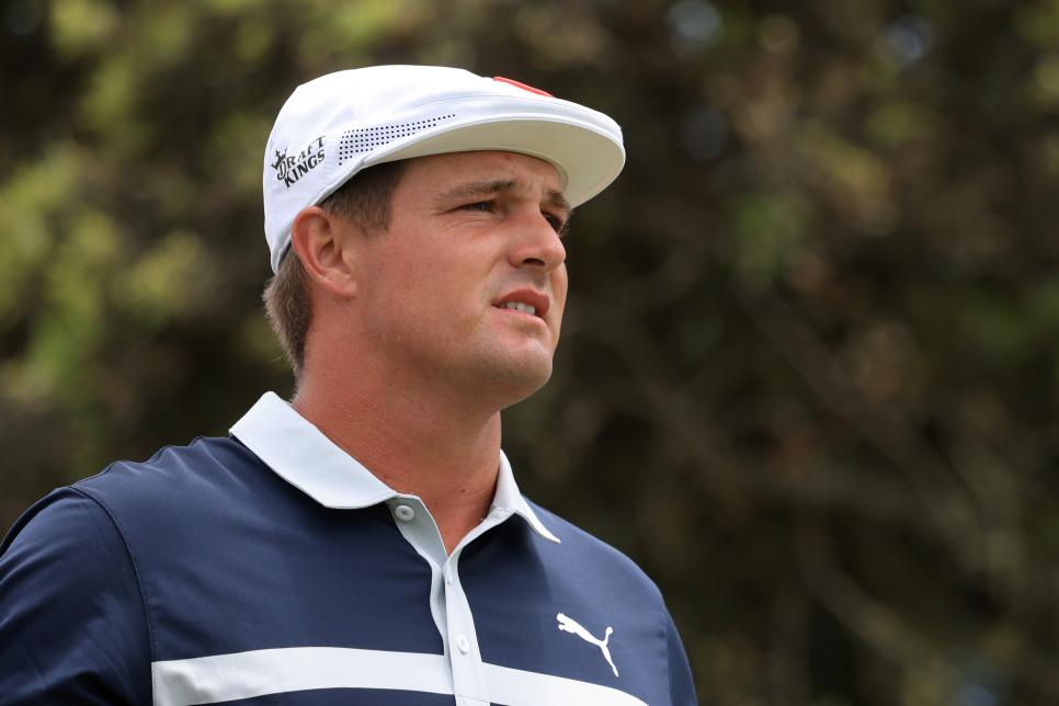 Bryson DeChambeau’s chances die with a slip, a streaker, a beer box and a back-nine implosion