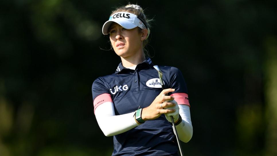 Nelly Korda whiffs a bunker shot en route to an opening 74 at the Amundi Evian Championship
