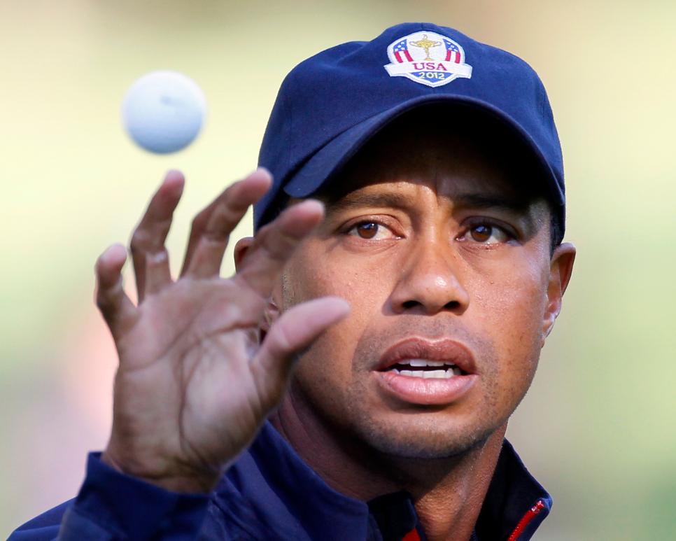 Tiger congratulates winning U.S. team after motiving them all week