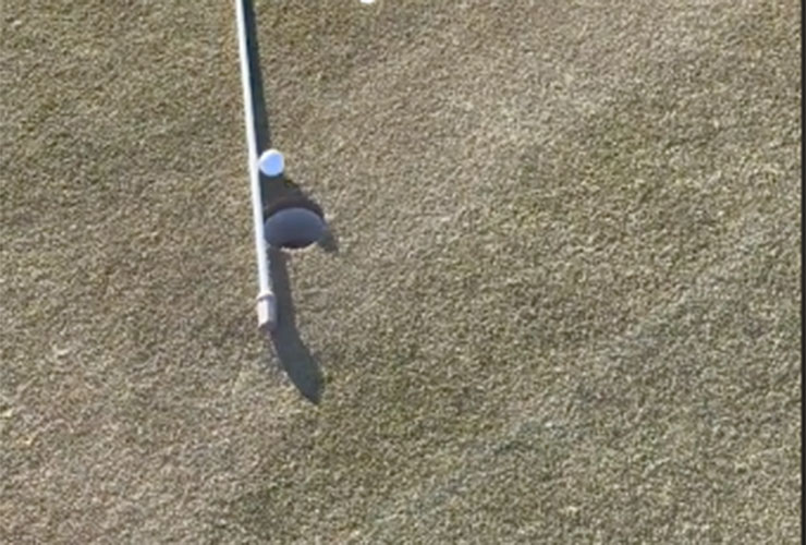 WATCH: Guy gets paired with stranger who uses flagstick as putting bumper, posts this unbelievable footage