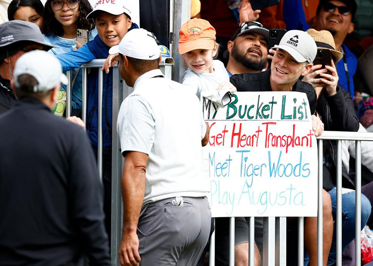 This feel-good story with a 9-year-old girl’s poster and Tiger Woods gets even better