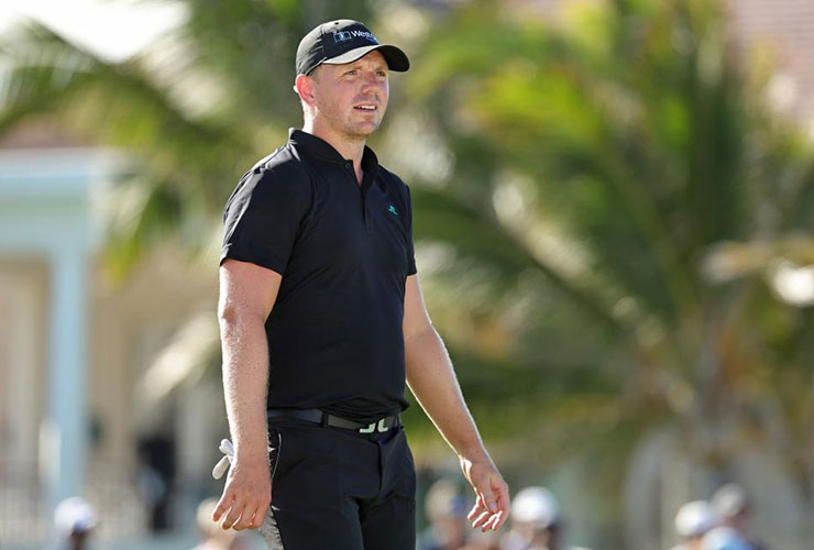 Englishman Wallace, with a rep for running hot, keeps his cool and now is a PGA Tour winner