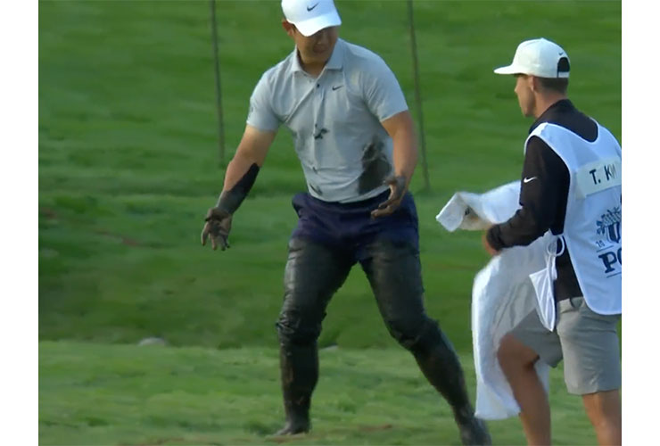 WATCH: Tom Kim falls into creek at PGA Championship, gets caked in mud, remains a delight