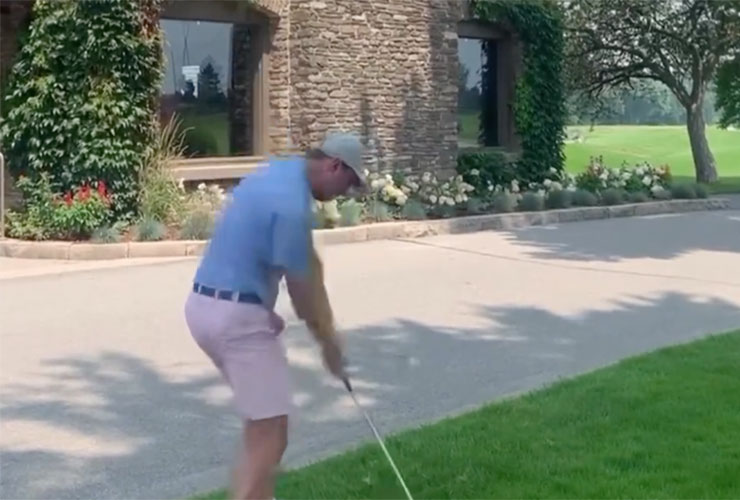 WATCH: Guy hits one over clubhouse to 15 feet on 18th hole of club championship, delivers shot of the year (and maybe the century)