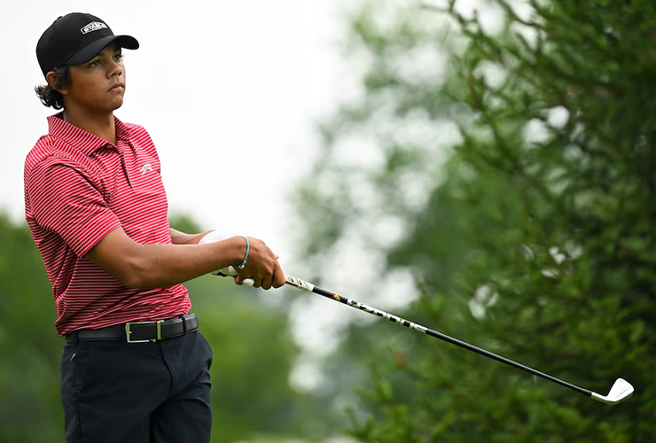 Donned in red and black, Charlie Woods’ 9 birdies for second straight day has him T-2 at Junior PGA with 18 left
