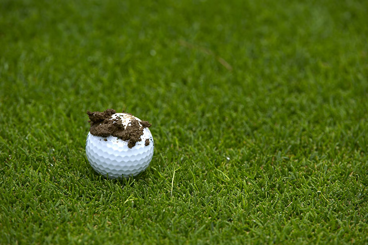Rules of Golf Review: Some mud landed on my ball after my opponent hit a shot. Can I lift and clean it?